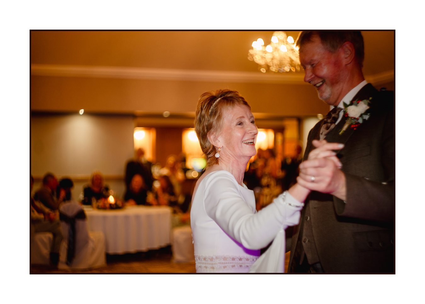 a couple dancing and smiling in their first dance at rufflets hotel st andrews